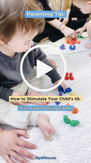 child sorting by colors with sign language